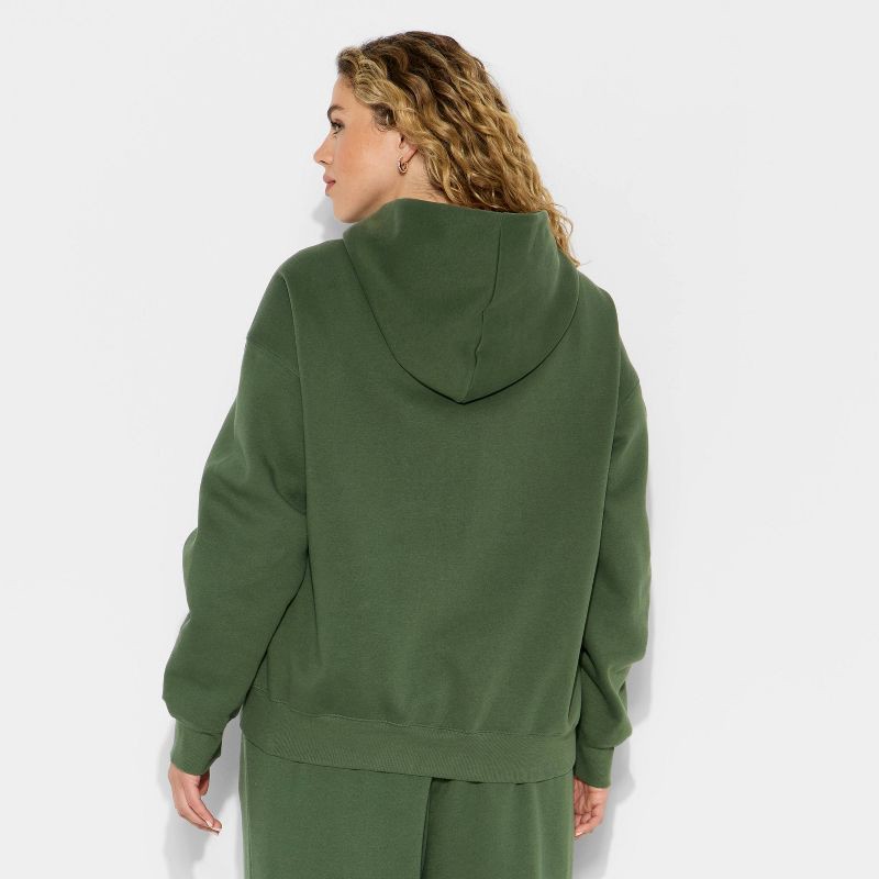 slide 3 of 3, Women's Oversized Bubble Hem Hooded Sweatshirt - Wild Fable™ Dark Green XXL, 1 ct