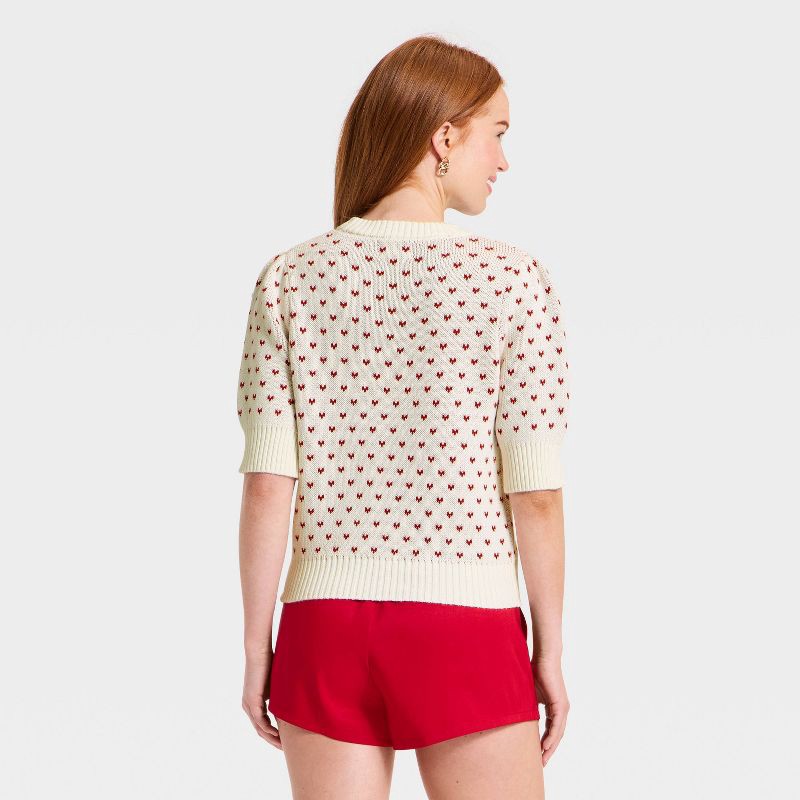 slide 2 of 3, Women's Elbow Sleeve Valentine's Day Hearts Crewneck Pullover Sweater - Universal Thread™ Cream M, 1 ct