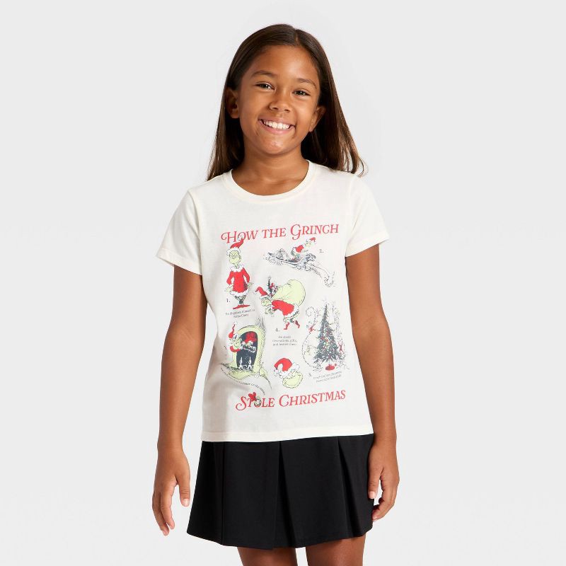 slide 1 of 4, Girls' Dr. Suess 'How The Grinch Stole Christmas' Short Sleeve Graphic T-Shirt - Ivory XS, 1 ct