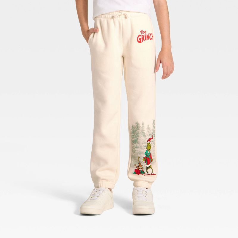 slide 4 of 5, Kids' Dr. Seuss The Grinch Fleece Sweatpants - Cream M, 1 ct
