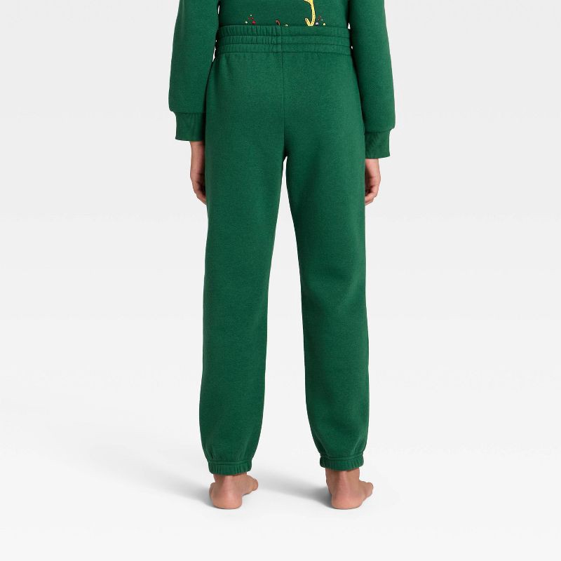 slide 5 of 5, Kids' Dr. Seuss The Grinch Evergreen Fleece Sweatpants - Dark Green L, 1 ct