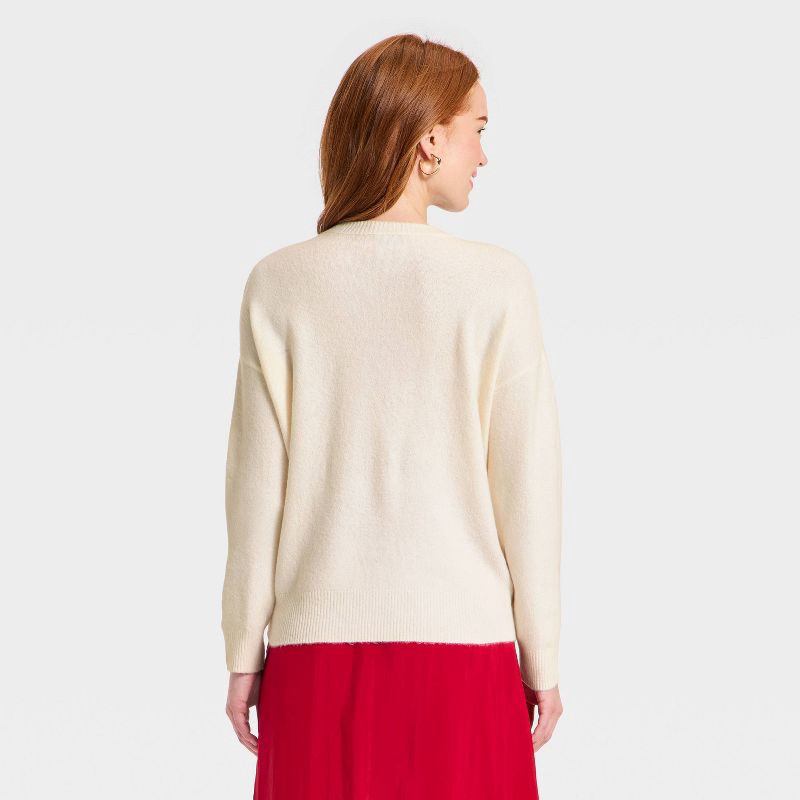 slide 2 of 3, Women's Valentine's Pullover Heart Sweater - A New Day™ Cream L, 1 ct