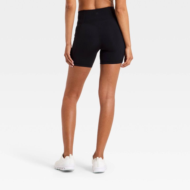 slide 2 of 5, Women's Super Flex High Rise Pocketed Bike Shorts 5" - All in Motion™ Black M, 1 ct