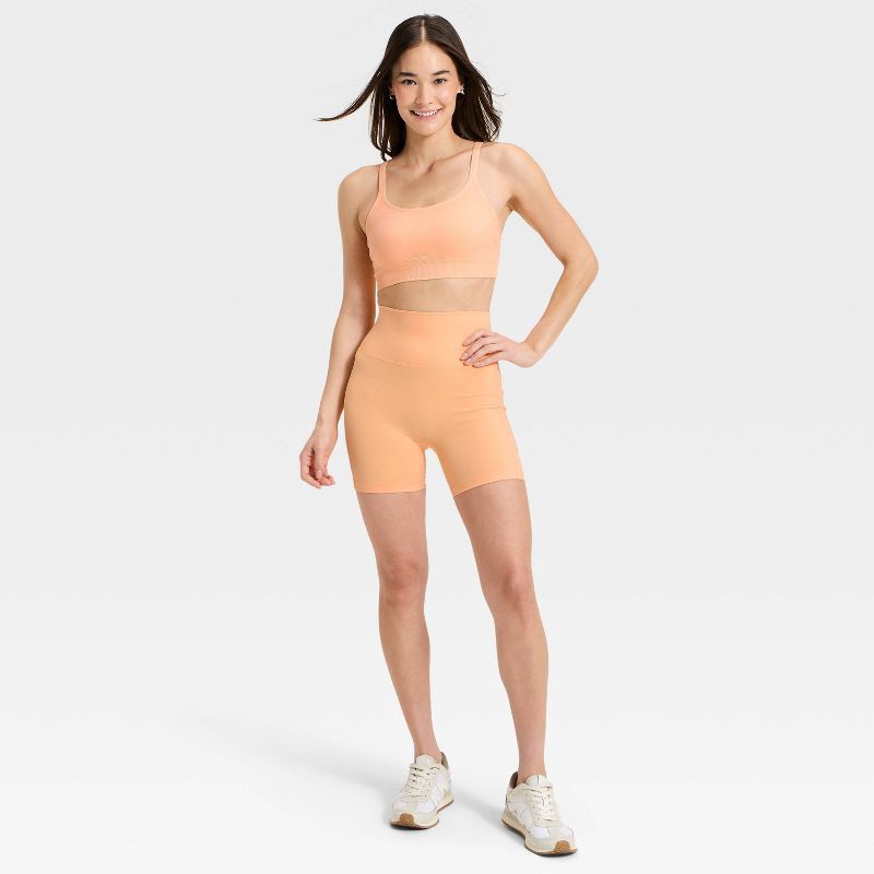 slide 3 of 5, Women's Super Flex High Rise Pocketed Bike Shorts 5" - All in Motion™ Melon Orange XXL, 1 ct