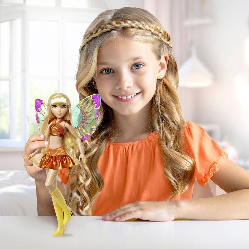 slide 2 of 10, Winx Club Stella Fairy 10.5" Fashion Doll with Glitter Outfit and Removable Wings, 1 ct