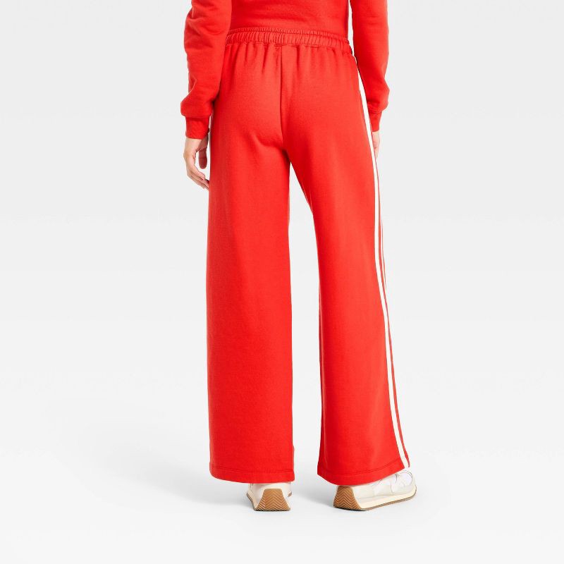 slide 2 of 3, Women's Mid-Rise Straight Leg Track Sweatpants - Universal Thread™ Red XS, 1 ct