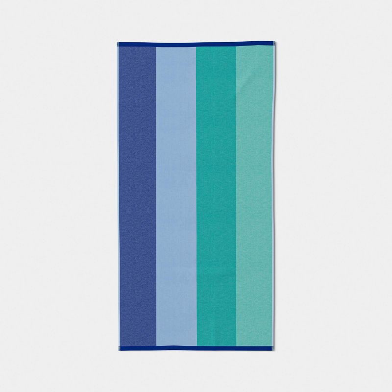 slide 1 of 4, 32"x62" Wide Multi Striped Reversible Beach Towel Blue/Teal - Sun Squad™, 1 ct