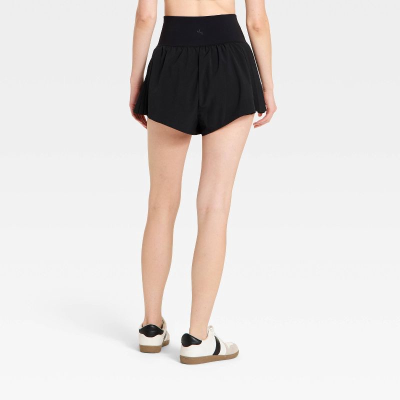 slide 2 of 4, Women's Pleated Side Woven Shorts - JoyLab™ Black L, 1 ct