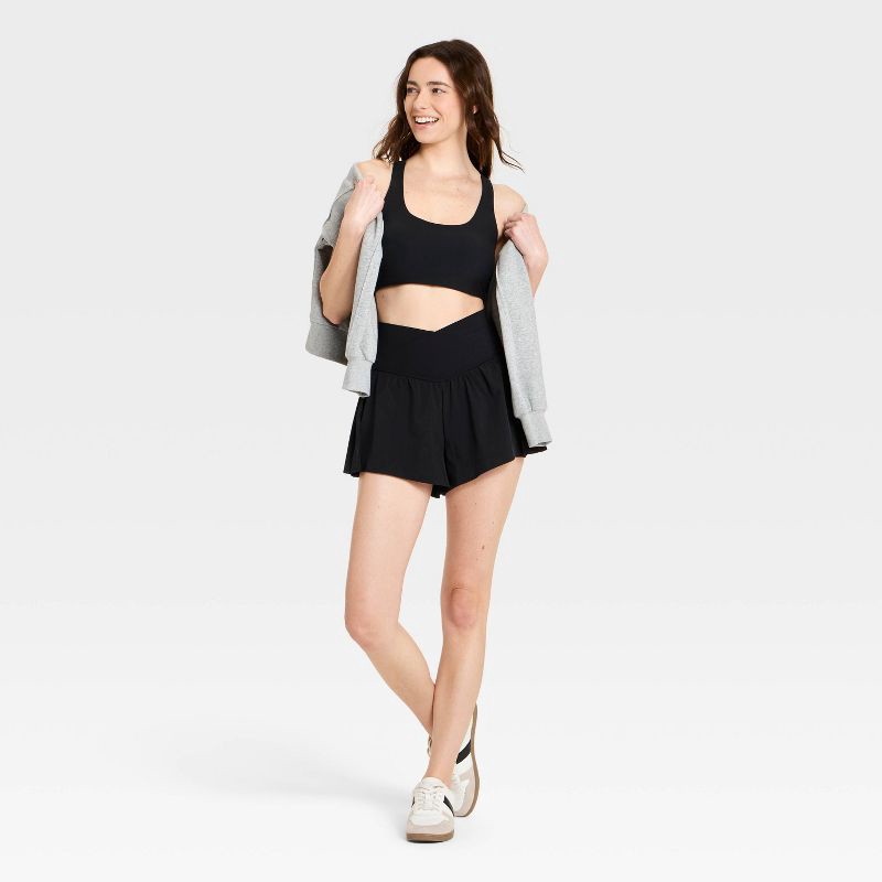 slide 3 of 4, Women's Pleated Side Woven Shorts - JoyLab™ Black L, 1 ct