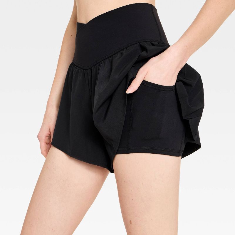 slide 4 of 4, Women's Pleated Side Woven Shorts - JoyLab™ Black L, 1 ct