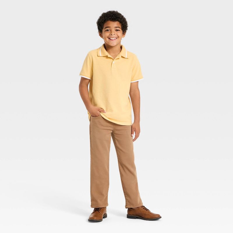 slide 3 of 3, Boys' Short Sleeve Tipping Polo Shirt - Cat & Jack™ Yellow XS, 1 ct