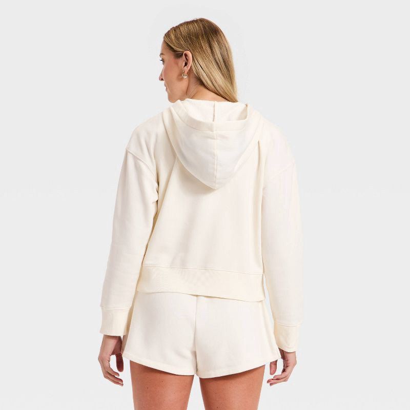 slide 2 of 3, Women's Lace Up Hoodie Pullover Sweatshirt - Universal Thread™ Cream M, 1 ct