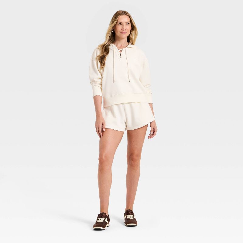 slide 3 of 3, Women's Lace Up Hoodie Pullover Sweatshirt - Universal Thread™ Cream M, 1 ct