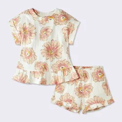 Baby Girls' 2pc Polka Dot Peplum T-Shirt and Ruffle Shorts Set - Cloud Island™ Cream Newborn