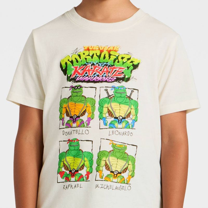 slide 2 of 4, Boys' Teenage Mutant Ninja Turtles Tortoise Karate Short Sleeve Graphic T-Shirt - Ivory XS, 1 ct