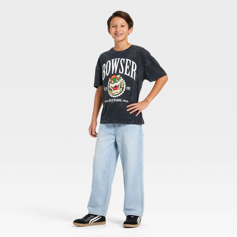 slide 4 of 4, Boys' Nintendo Bowser Short Sleeve Oversized Graphic T-Shirt - Black Wash M, 1 ct