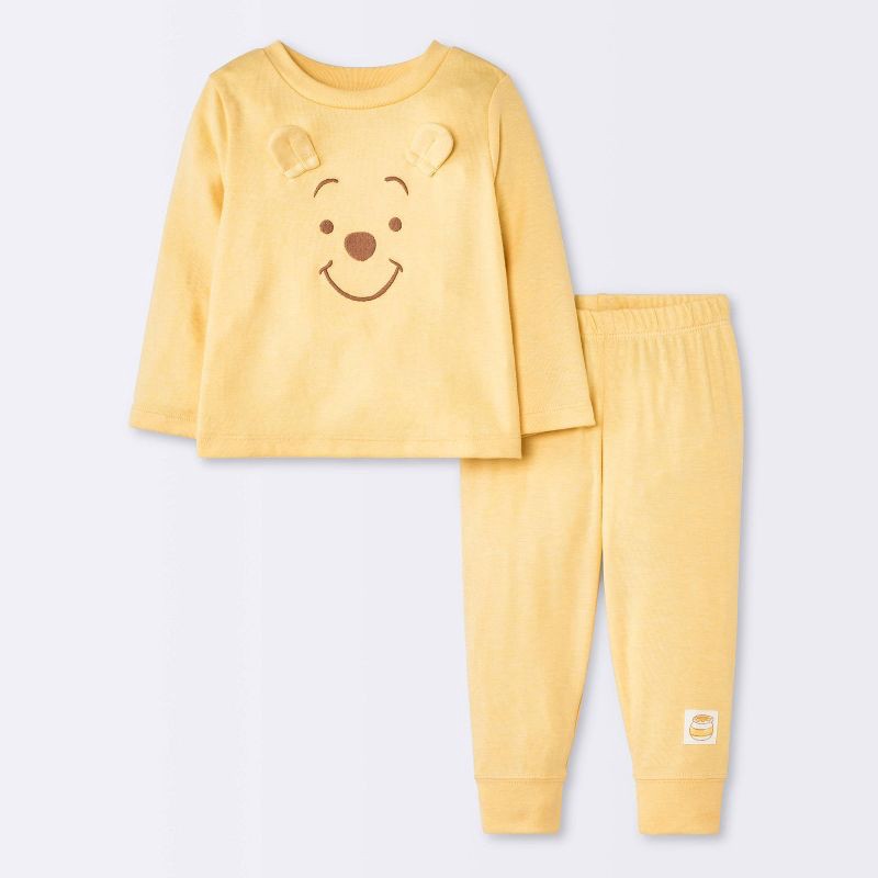 slide 1 of 4, Baby 2pc Winnie the pooh Top and Pants Set - Cloud Island™ Yellow Newborn, 2 ct