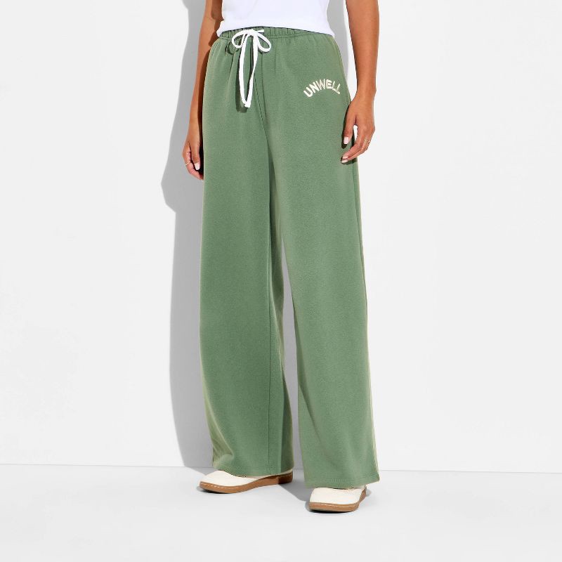 slide 2 of 3, Women's Unwell Wide Leg Graphic Sweatpants - Green XXS, 1 ct
