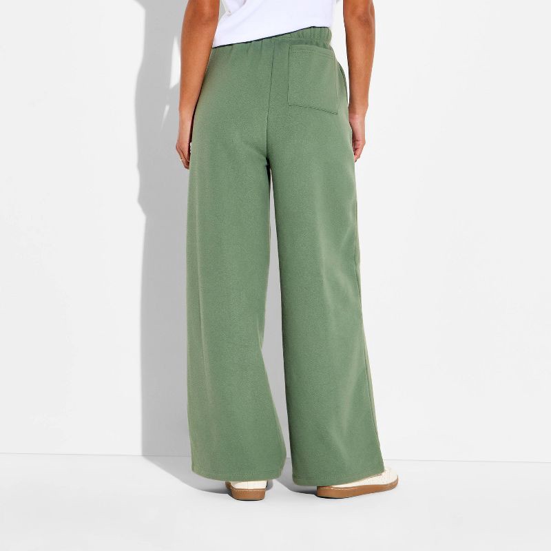 slide 3 of 3, Women's Unwell Wide Leg Graphic Sweatpants - Green XXS, 1 ct
