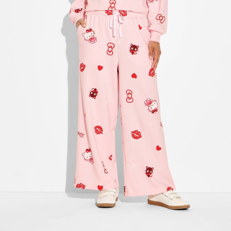 slide 2 of 3, Women's Hello Kitty Fleece Graphic Sweatpants - Light Pink S, 1 ct