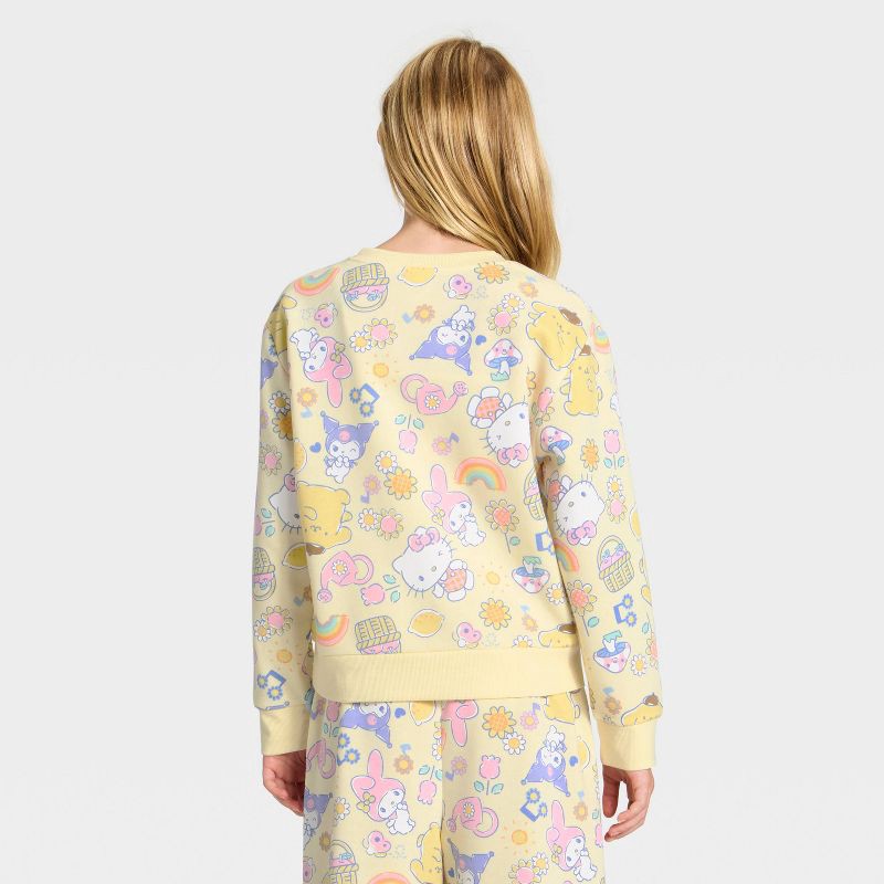 slide 2 of 3, Sanrio Girls' Hello Kitty and Friends Printed Fleece Sweatshirt - Light Yellow L, 1 ct