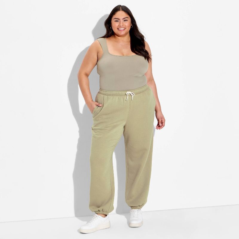 slide 1 of 3, Women's Mid-Rise Baggy Jogger Pants - Wild Fable™ Dark Taupe XXL, 1 ct
