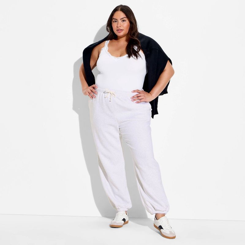 slide 1 of 3, Women's Mid-Rise Baggy Jogger Pants - Wild Fable™ Heather Gray XXL, 1 ct