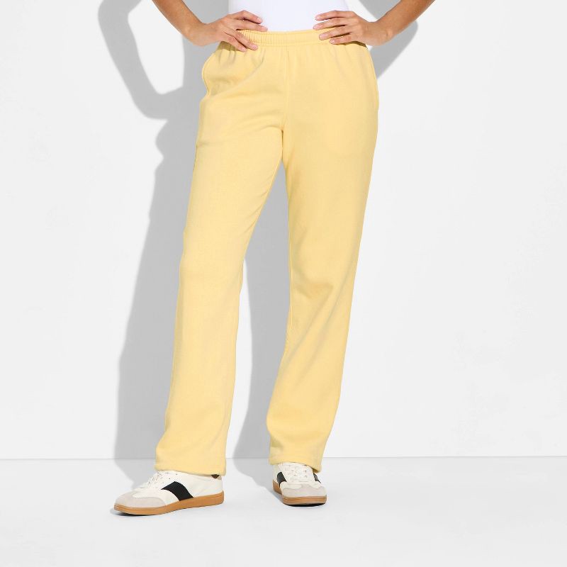 slide 2 of 3, Women's Mid-Rise Slim Straight Sweatpants - Wild Fable™ Light Yellow L, 1 ct