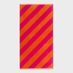 36"x72" Reversible Diagonal Striped Oversized Beach Towel Pink/Orange - Room Essentials™