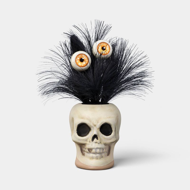 slide 1 of 3, 7" Grim Greenery Eyeballs Plastic Skull Pot Needle Like Halloween Artificial Plants - Hyde and EEK! Boutique™, 7 in