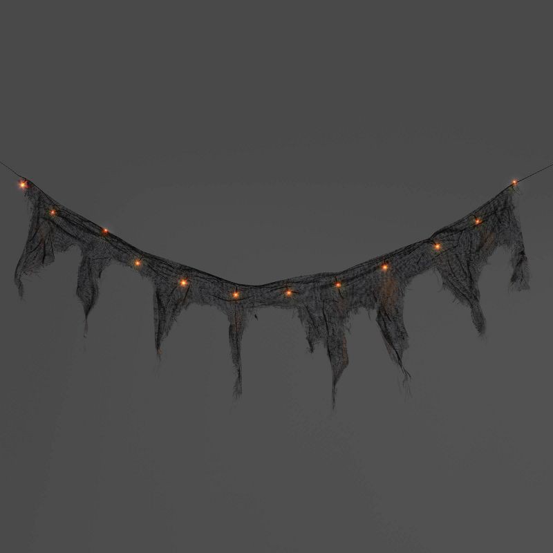 slide 1 of 5, 12ct LED Lit Black RGB Gauze Garland Halloween Novelty String Lights White - Hyde and EEK! Boutique™, 12 ct