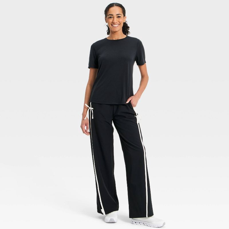 slide 3 of 5, Women's Beyond Ease Crewneck Legging Friendly Short Sleeve T-Shirt - All In Motion™ Black S, 1 ct