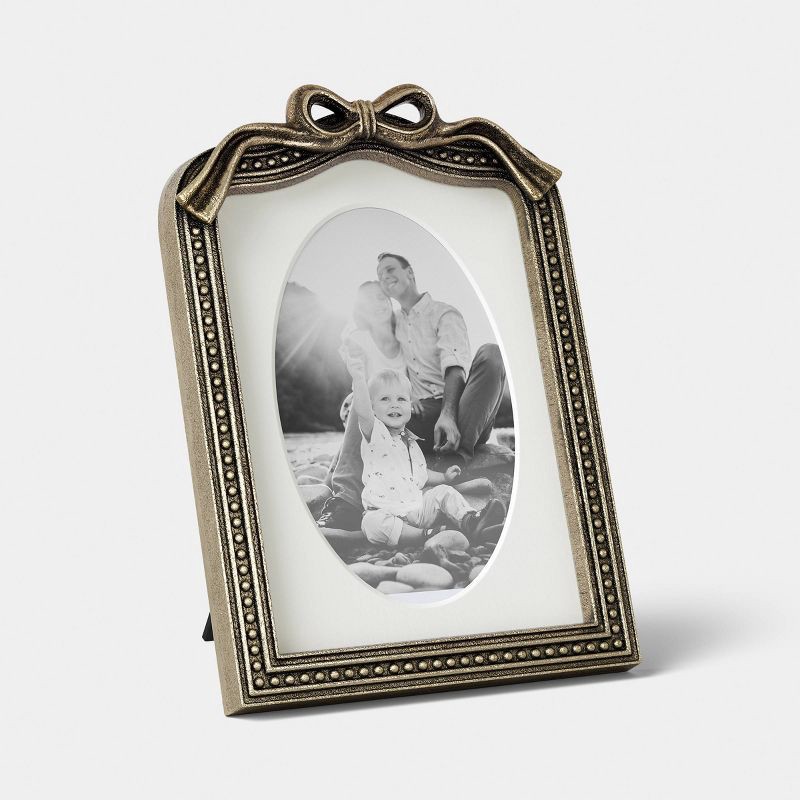slide 1 of 5, 5"x7" Antique Brass Picture Frame with Bow - Threshold™, 1 ct