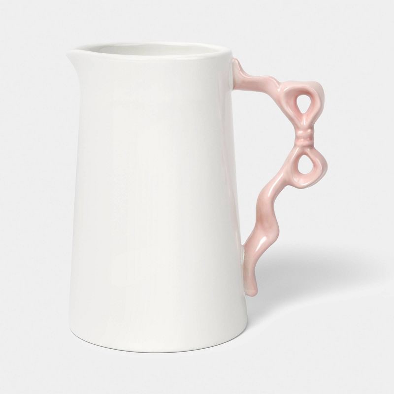 slide 1 of 3, 25.63 fl oz Stoneware Bow Beverage Pitcher - Room Essentials™, 25.63 fl oz