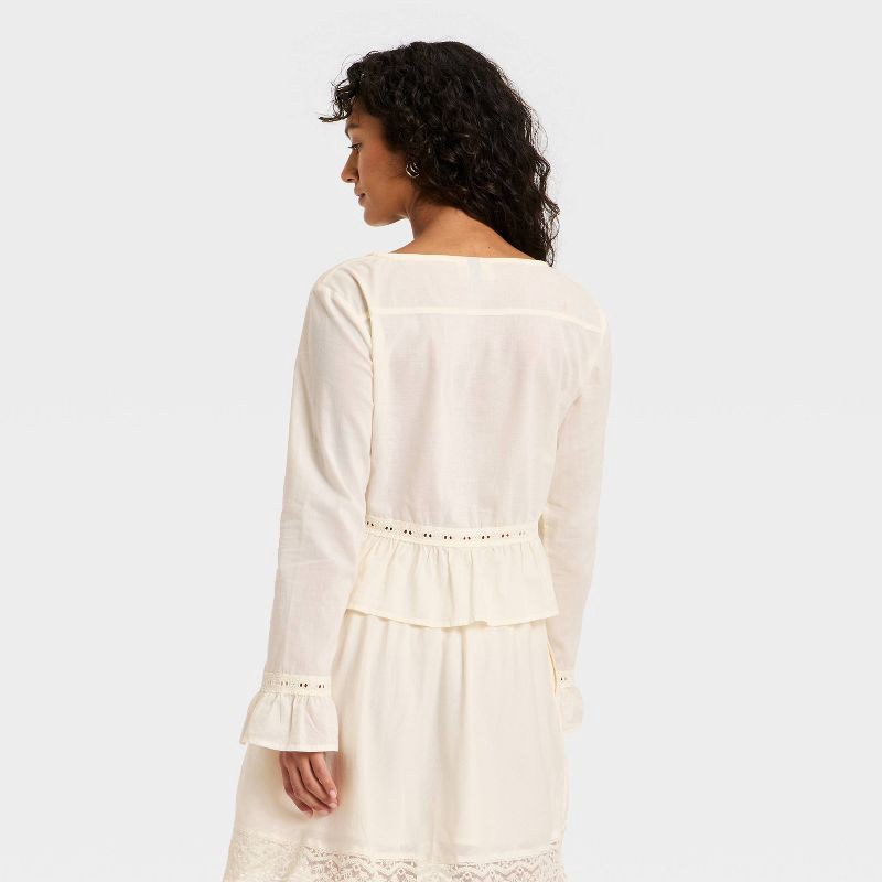 slide 2 of 3, Women's Ruffle Long Sleeve Lace Trim Blouse - Universal Thread™ Cream L, 1 ct