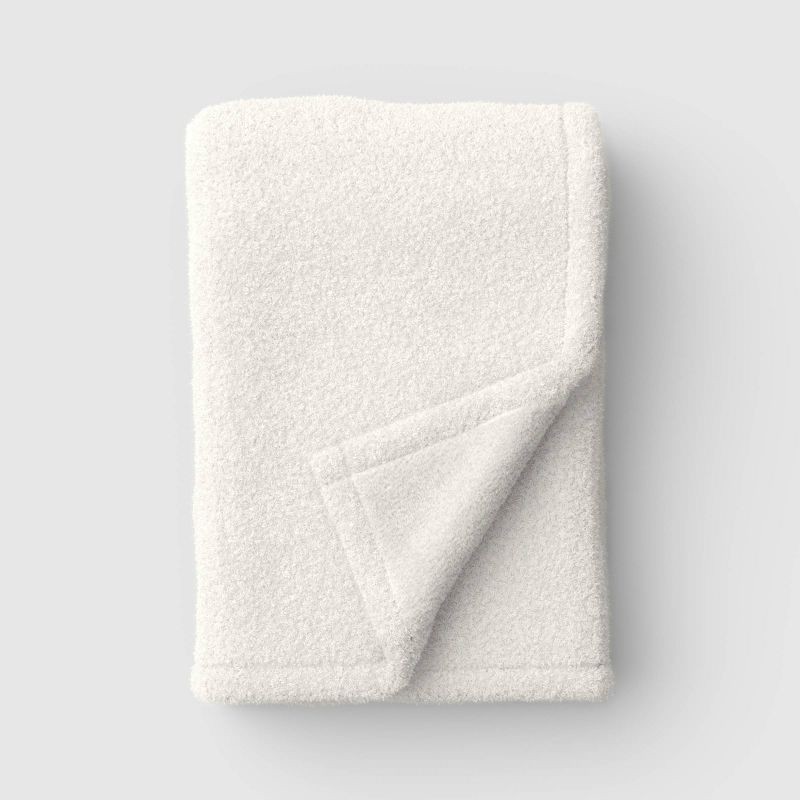slide 1 of 4, 50"x70" Solid Comfort Plush Throw Ivory - Room Essentials™, 1 ct