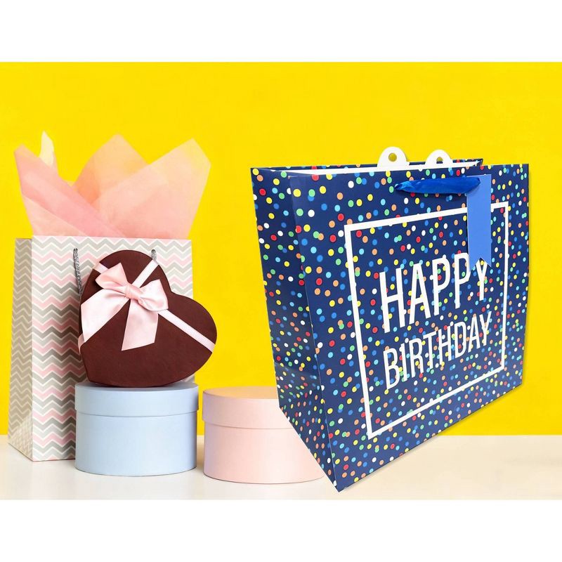 slide 2 of 3, Bows And Sparkles Large Square 'Happy Birthday' Confetti Gift Bag with Tag Blue, 1 ct