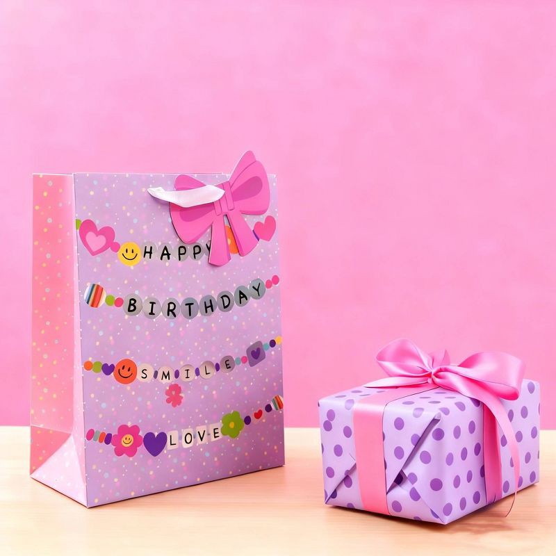 slide 4 of 4, Bows And Sparkles Large Birthday Bracelets Gift Bag with Tag Purple, 1 ct