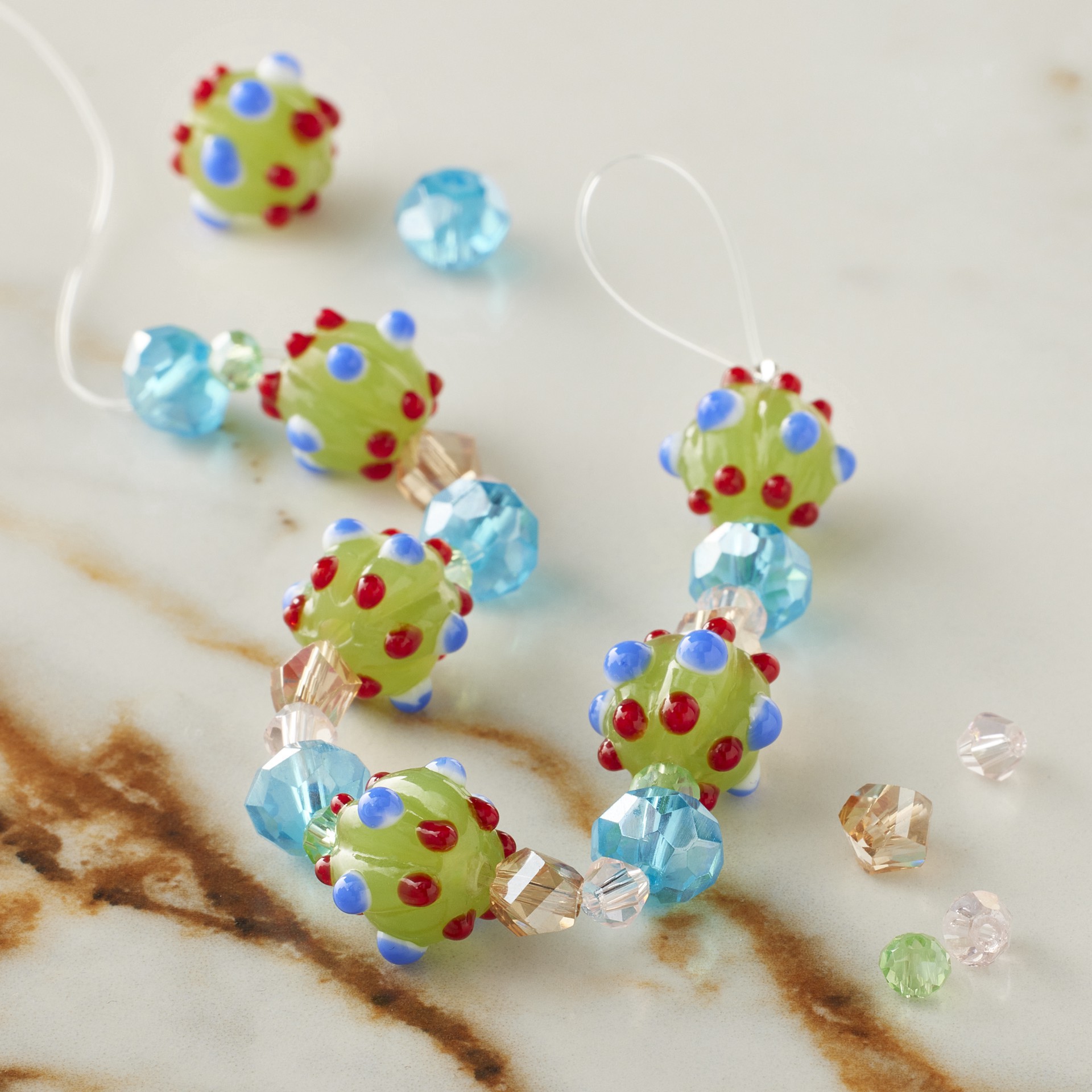 slide 3 of 3, Green Lampwork Glass Bumpy Round Beads By Bead Landing, 10mm-13mm