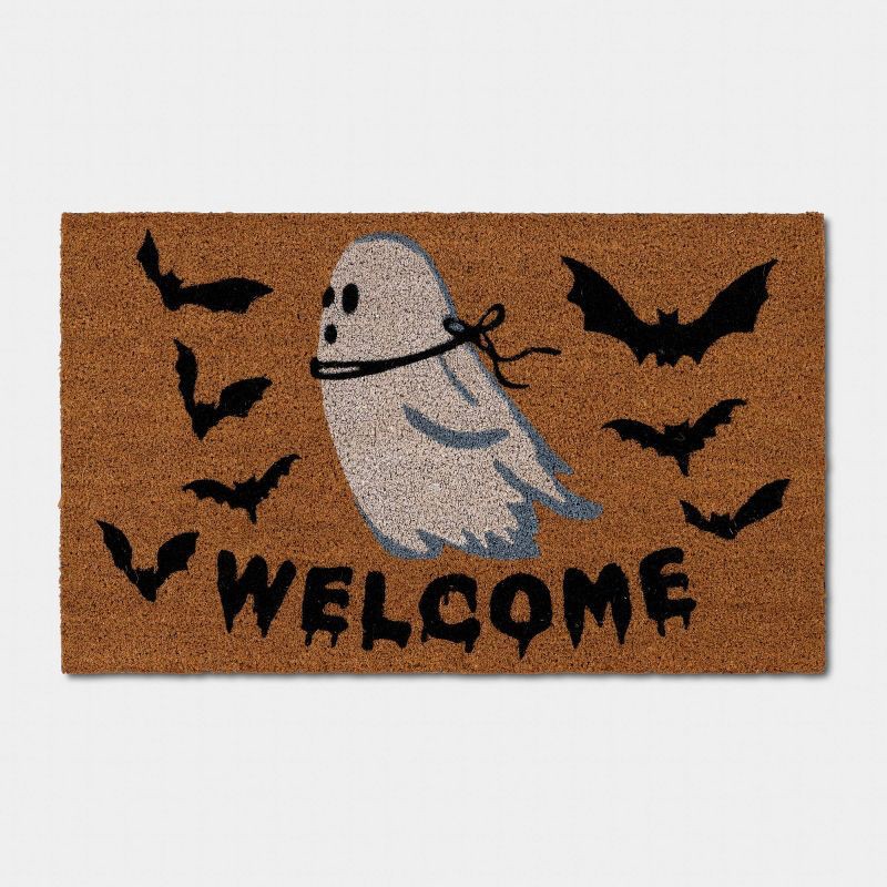 slide 1 of 4, 18"x30" Ghost 'Welcome' Bats Bone Parlour Halloween Coir Doormat White/Black - Hyde and EEK! Boutique™, 1 ct