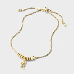 14k Gold Dipped Letter "R" Twist Initial with Cubic Zirconia Bail Bolo Bracelet - A New Day™ Gold