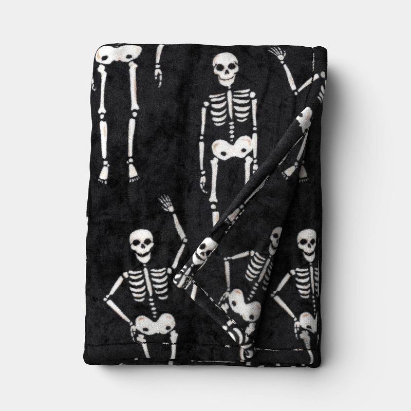 slide 1 of 5, Halloween Skeletons Throw Blanket Black/Ivory - Hyde and EEK! Boutique™, 1 ct