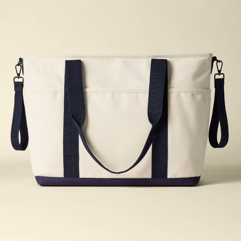 slide 1 of 5, Canvas Tote Solid Shoulder Diaper Bag - Ivory and Navy - Cloud Island™, 1 ct