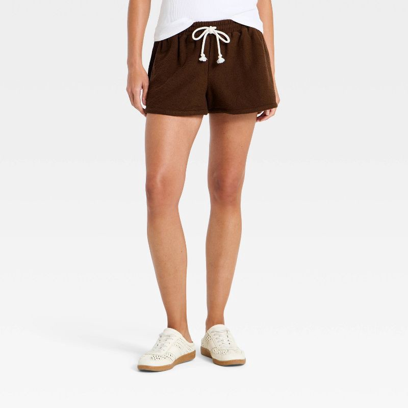 slide 1 of 3, Women's Mid-Rise Textured Knit Pull-On Shorts - Universal Thread™ Brown M, 1 ct