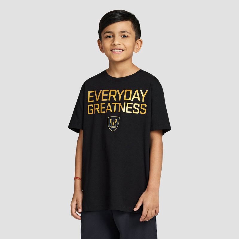 slide 1 of 4, Boys' Messi "Everyday Greatness" Classic Fit Short Sleeve Knit Graphic T-Shirt - Black L, 1 ct