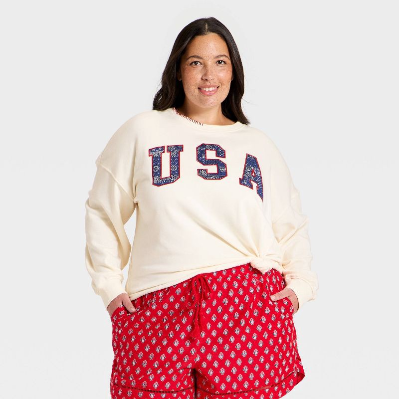 slide 1 of 4, Women's Americana Pullover Sweatshirt - Universal Thread™ Cream Letters XXL, 1 ct