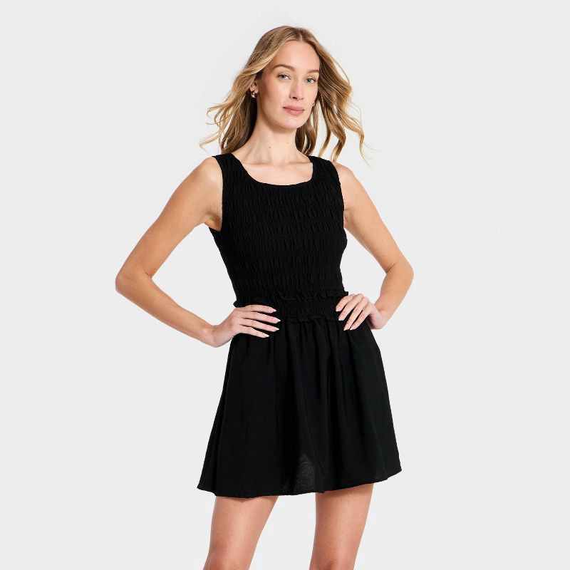slide 1 of 3, Women's Smocked Mini A-Line Dress - A New Day™ Black XS, XS