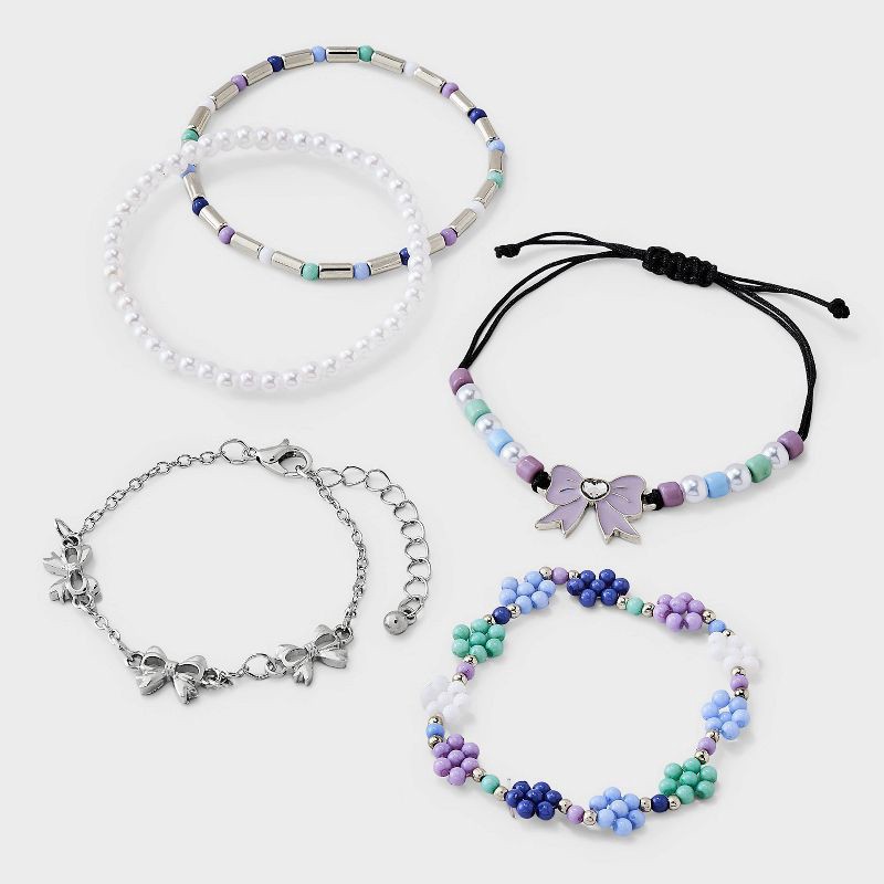 slide 1 of 3, Girls' Mixed Bracelet Set with Bows and Beaded Flowers 5pc - Cat & Jack™ Silver/Purple, 5 ct