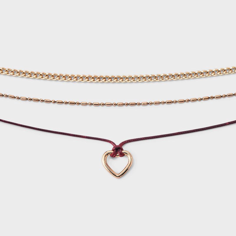slide 1 of 3, Girls' Layered Rope Heart Necklace 3pc - art class™ Gold/Burgundy, 3 ct