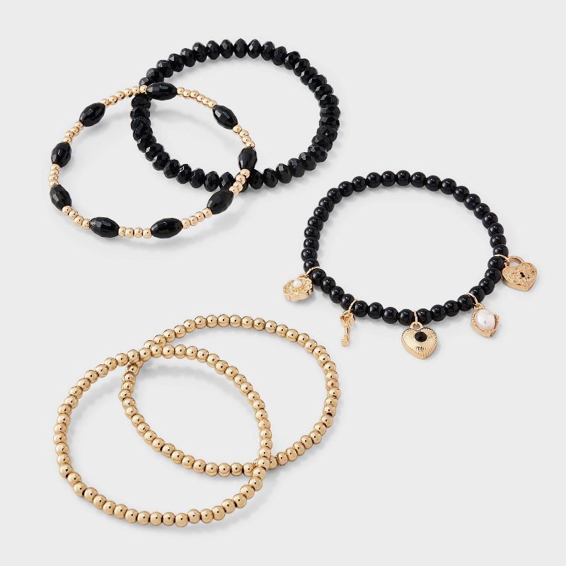 slide 1 of 3, Girls' Stretch Bracelet Set with Heart, Lock & Key Charms 5pc - art class™ Black/Gold, 5 ct